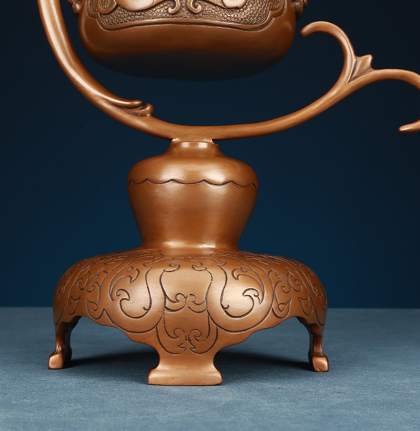 Base Detail of Ruize Feng Shui Red Copper Kui Dragon Pattern Hanging Incense Burner - Ornate Pedestal and Carved Motifs