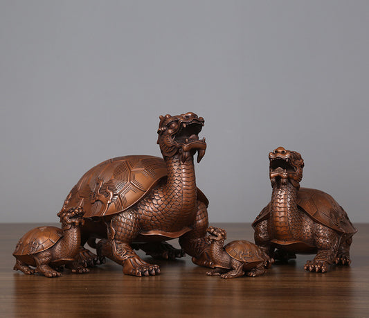 Collection of hollow bronze dragon turtle figurines in four different sizes