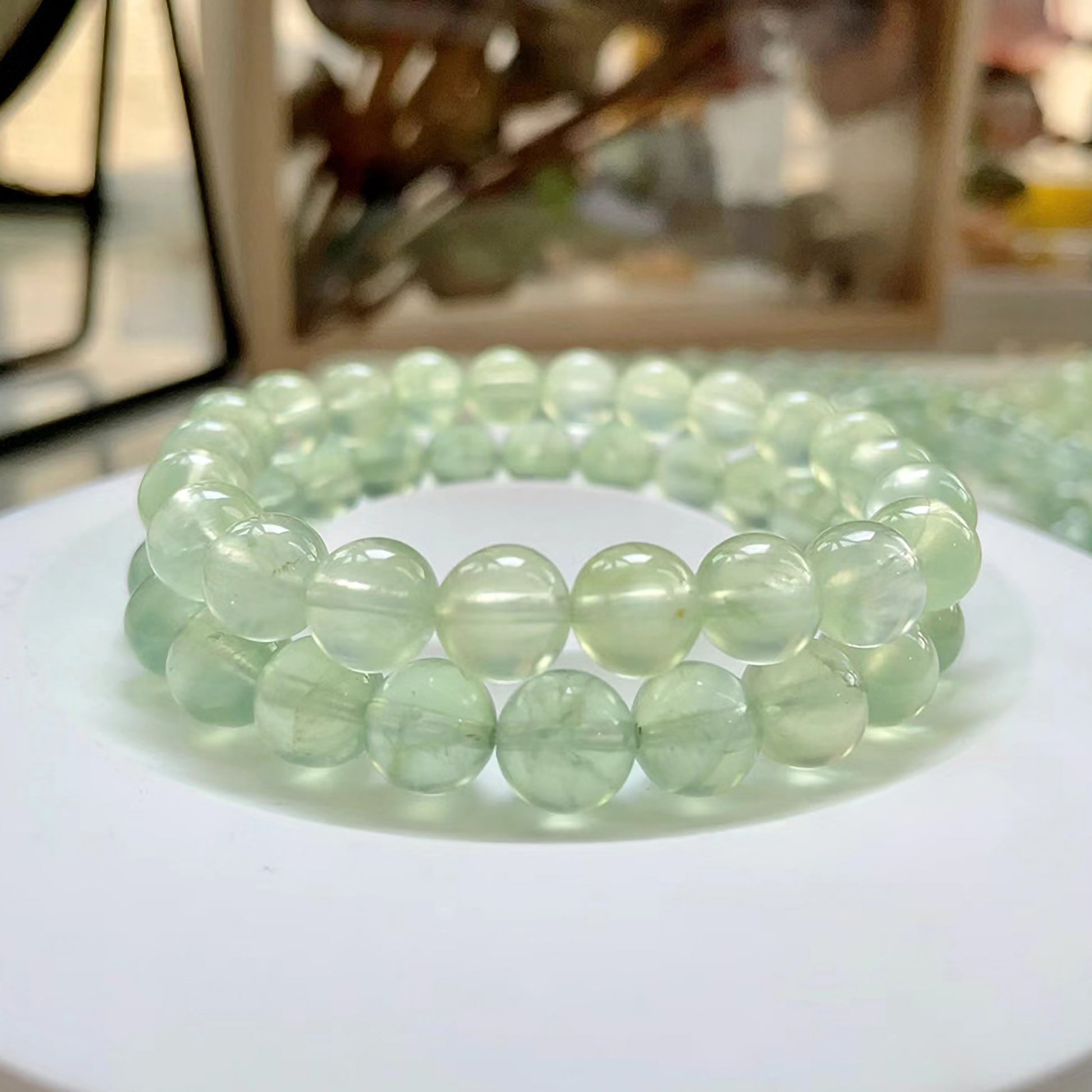 Natural Grape Jade beaded bracelet with smooth purple-green gemstones for calming energy