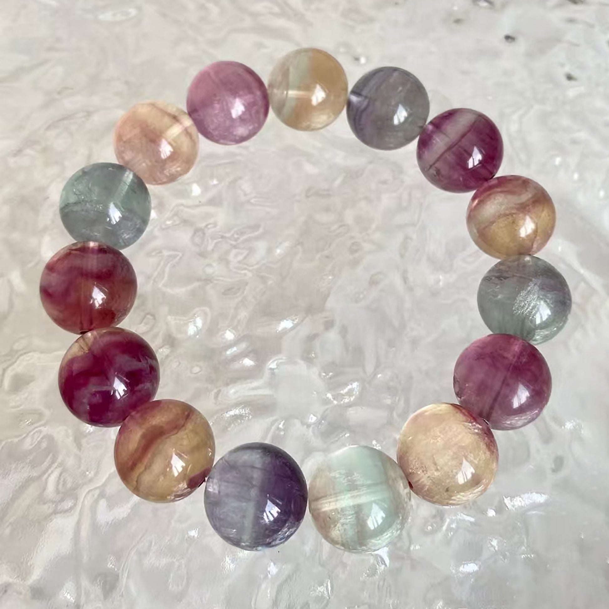 Natural Rainbow Fluorite beaded bracelet with vibrant multicolor gemstones for energy cleansing and focus