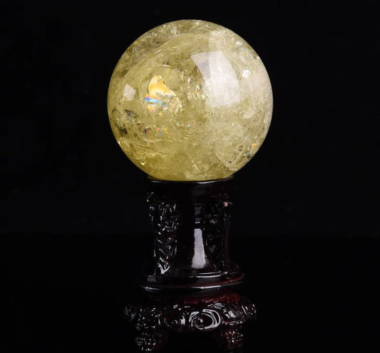 Natural yellow citrine crystal sphere with wooden display stand for Feng Shui home décor
